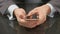 Boss using expensive smartphone, thumb touching screen closeup