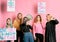 Bossy strong girls feminists isolated in pink background