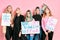 Bossy strong girls feminists isolated in pink background