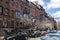Boston, MA - April 8 2021: Rows of brownstone apartment brick buildings in Boston with front yards, trees and in Pennsylvania