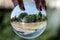 Boston, MA, USA 06.09.2017 Crystal ball view on People Enjoy Cooling Spray at Frog Pond on hot summer day public Park