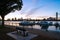 Boston skyline at sunrise with boats and harbor