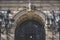 Boston, USA - October 22, 2021: Entrance to Boston Public Library with arched iron gate and decorative Victorian lamps