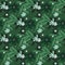 Botanic seamless pattern with creative foliage ornament and simple flower silhouettes. Green background