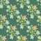 Botanic seamless pattern with green flowers silhouettes and little daisy elements in blue and pink colors. Green