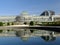 Botanical garden reflecting into water. Brussels: `Le botanique`