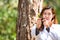 Botanical scientist. Surveying of botanists. Woman studying plants in the forrest. Scientists are examining tree in the forest