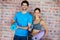We are both fitness fanatics -Fitness Couple. Portrait of a gym going couple who are both holding gym mats.
