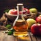 Bottle apple cider vinegar and fresh apples in wooden backgrounds