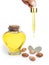 Bottle with argan oil. Cosmetic means. Food product. Isolated background.