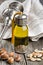 Bottle of Argan oil and fruits