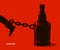 Bottle as a weight on shackles chain to leg alcoholism metaphor vector trendy design of social advertising poster or banner,