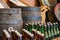 A bottle crate stacked on top of a wooden barrel at an attic of a beer brewery