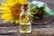 A bottle of elecampane essential oil and flowers