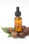 Bottle of essential chestnut oil , spa massage oil