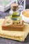 Bottle of essential oil, bars of handmade soap and soft towel