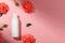 Bottle with facial product isolated in pink background. Blank unbranded tube in mockup style. Copy space in right side. Skincare