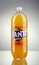 Bottle of Fanta drink on gradient background.