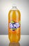 Bottle of Fanta drink on gradient background.