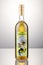 Bottle of fig flavored rakija isolated on gradient background produced in Omis, Croatia.