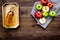 Bottle of fresh cider near autumn apples. Dark wooden background top view space for text