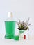 Bottle and glass of mouthwash on bath shelf with toothbrush. Dental oral hygiene concept. Set of oral care products