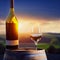 bottle with glass of white wine with sunset vineyard
