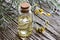 A bottle of helichrysum italicum essential oil with helichrysum