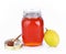 Bottle honey ,lemon on white background