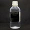 Bottle of ISOPROPYL ALCOHOL for medical and industrial use 99% pure on a black background. colorless, flammable compound