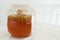 Bottle of kombucha tea with scoby brewing