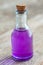 Bottle of lavender essential oil or potion.