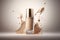 Bottle of makeup foundation and samples on beige background. Cosmetic product presentation. Luxury flying liquid in