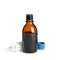 Bottle of medical iodine and cotton buds on white background