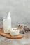 A bottle of milk and glass of yogurt, kefir, fermented milk, Probiotic cold fermented dairy drink. top view