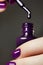 Bottle of nail polish. Beauty hands. Trendy stylish colorful nails, nailpolish. Great idea for the advertising of cosmetics. Beau