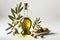 Bottle olive oil and green olives with leaves on white background, generative Ai