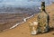 Bottle overgrown with mussels and sea