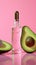 Bottle of perfume. Avocado oil cosmetic pipette with drops of oil.