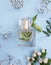 Bottle perfume springtime elegance   aroma  fragrance     flower bloom on a colored background