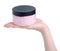 Bottle pink scrub for body in hand