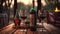 Bottle of red wine with glasses on a rustic table in a vineyard. Sunset on a farm with alcohol.