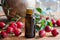 A bottle of rosehip seed oil on a wooden table