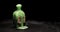 Bottle with skull and crossbones warning label, filled with toxic green liquid bubbling up and smoking. Concept for suicide by