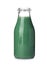 Bottle of spirulina smoothie on white