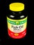 Bottle of Spring Valley Fish Oil Supplement on Black Backdrop