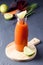 Bottle of Tasty Carrot Juice with Lime Juice Healthy Diet Detox Drink Vitamin Glass of Vegetable Juice Decorated With Fresh Carrot