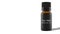 A bottle of tea tree essential oil with shadow on a white background. The idea of natural cosmetic, natural oils, aromatherapy,