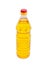 Bottle of unrefined sunflower oil on a light background
