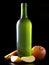 Bottle of very cold cider with apples with black background - image